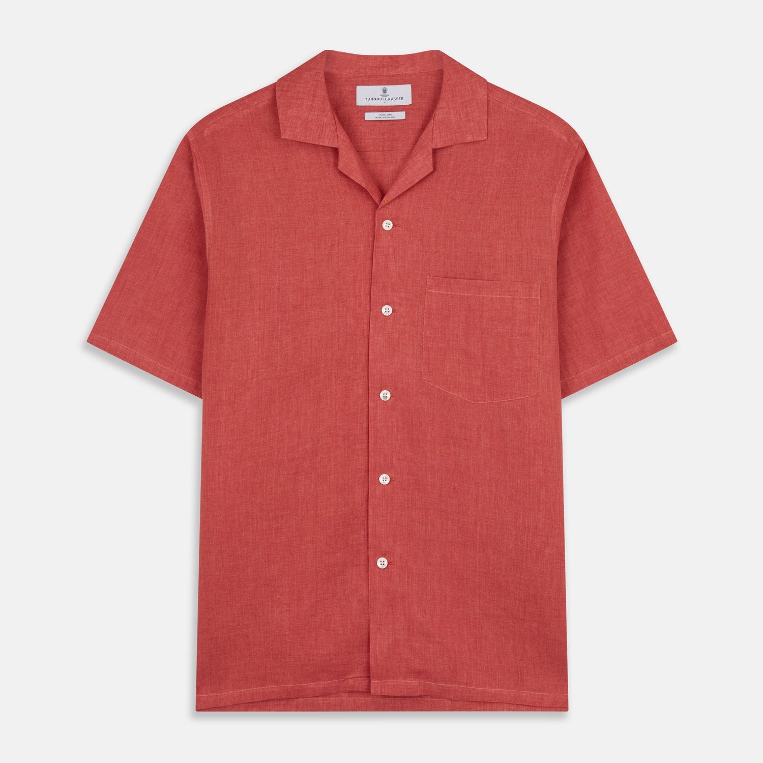 View 1 of product The Turnbull & Asser Crimson Delave Linen Holiday Fit Shirt features a solid brick-red hue, short sleeves, single chest pocket, and revere collar—perfect resort wear—shown laid flat on white.
