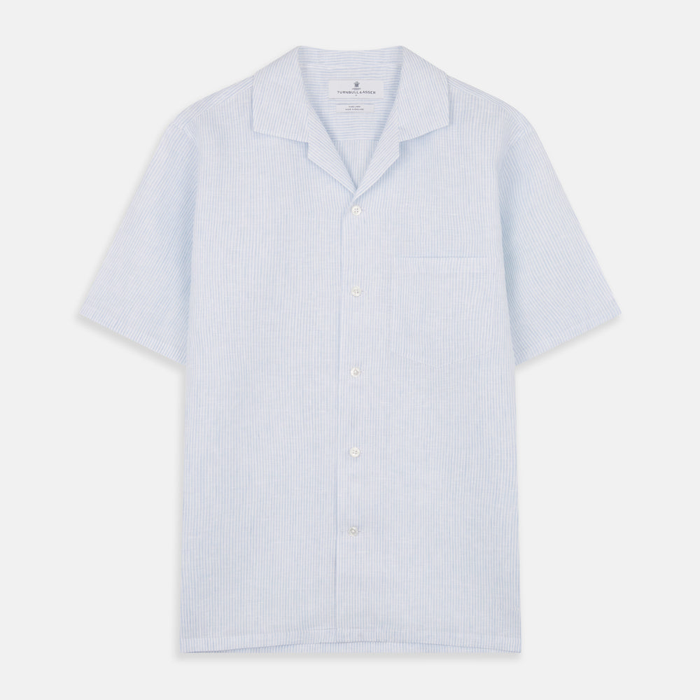 The Turnbull & Asser Blue Linen Stripe Holiday Fit Shirt features short sleeves, a revere collar, and single chest pocket, perfect for resort wear. Shown on a plain white background.