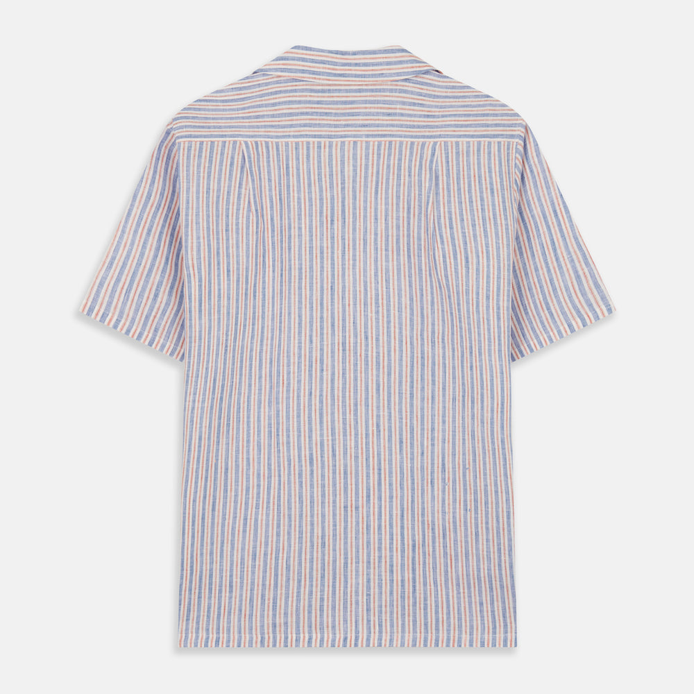 The Turnbull & Asser Blue and Red Linen Stripe Holiday Fit Shirt features a revere collar, relaxed fit, and short sleeves—perfect resort wear with vertical blue, white, and light red stripes.