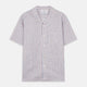 The Turnbull & Asser Blue and Red Linen Stripe Holiday Fit Shirt features a revere collar, relaxed fit, and short sleeves—perfect resort wear with vertical blue, white, and light red stripes.