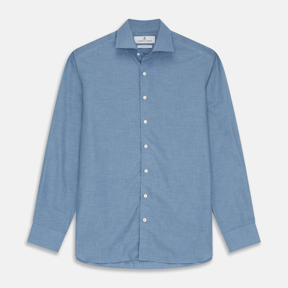The Turnbull & Asser Blue Tailored Fit Shirt features a Kent collar, 2-button cuffs, and white buttons—a versatile men’s wardrobe essential. Laid flat on a white background.
