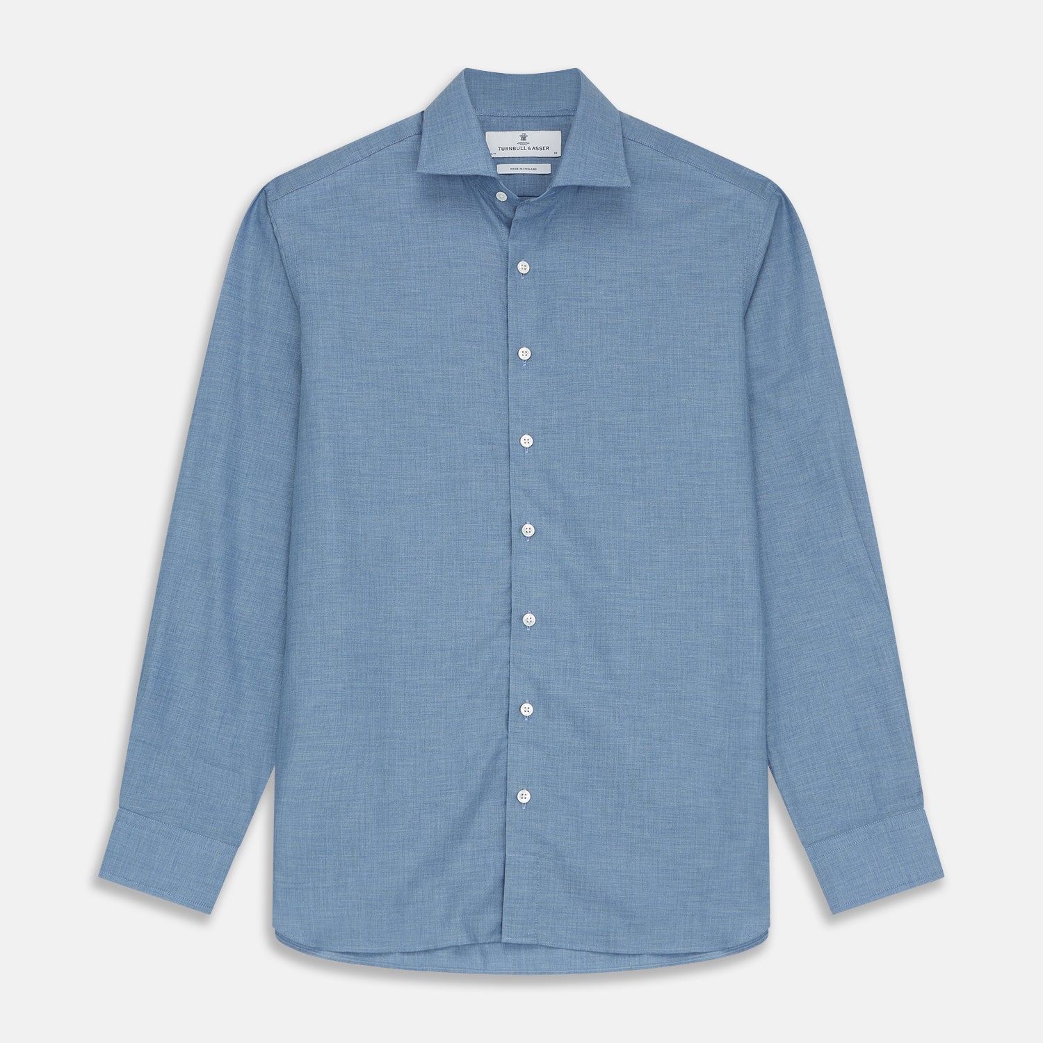 View 1 of product The Turnbull & Asser Blue Tailored Fit Shirt features a Kent collar, 2-button cuffs, and white buttons—a versatile men’s wardrobe essential. Laid flat on a white background.