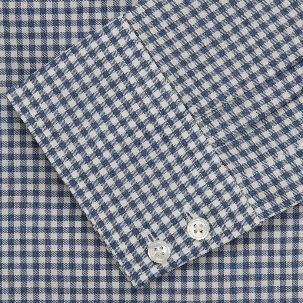 The Turnbull & Asser Blue Multi Check Tailored Fit Shirt features a Kent collar, 2-button cuffs, and a fine blue and white checked pattern—an essential men's wardrobe piece—shown flat on a white background.