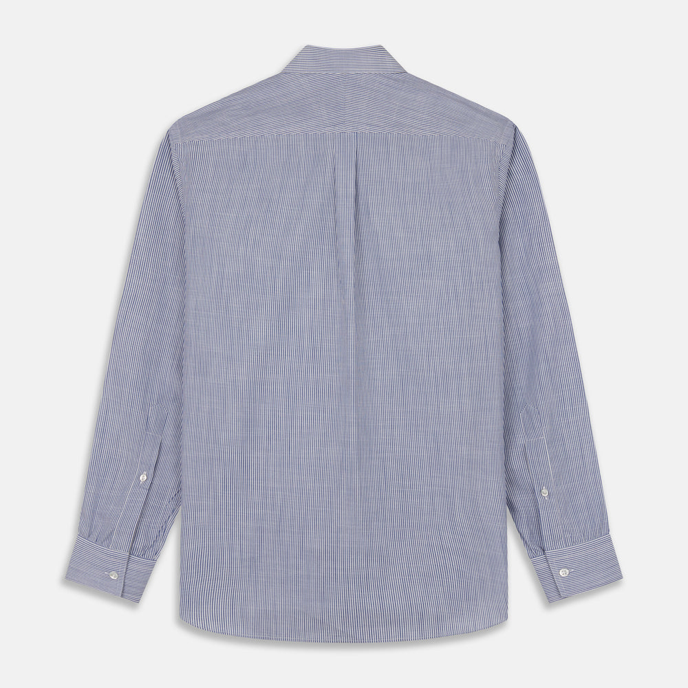 Turnbull & Asser’s Indigo Chambray Stripe Weekend Fit Shirt with Dorset collar features thin white pinstripes, two button-flap chest pockets, buttoned cuffs, and relaxed styling—presented flat on a white background.