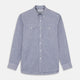 Turnbull & Asser’s Indigo Chambray Stripe Weekend Fit Shirt with Dorset collar features thin white pinstripes, two button-flap chest pockets, buttoned cuffs, and relaxed styling—presented flat on a white background.