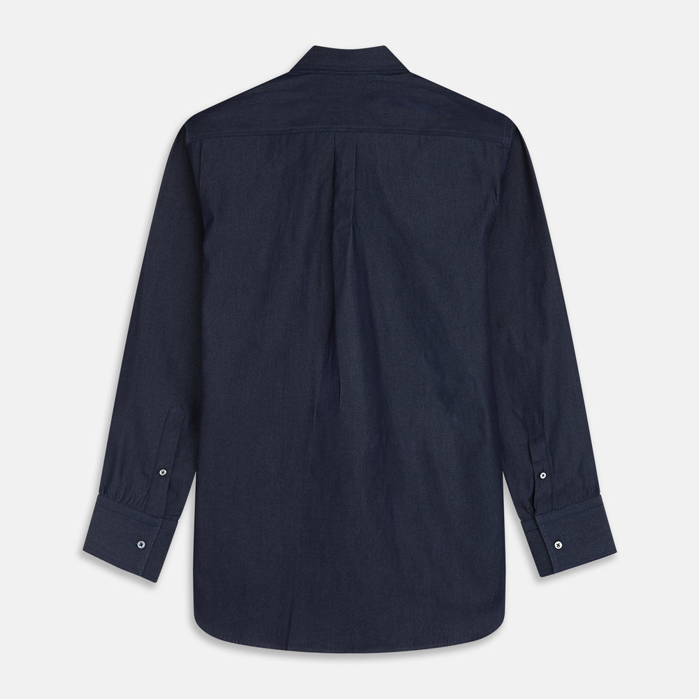 The Turnbull & Asser Navy Chambray Weekend Fit Shirt features a Dorset collar, long sleeves with 1-button cuffs, and two button-flap chest pockets. This officer’s shirt is displayed flat on a white background.