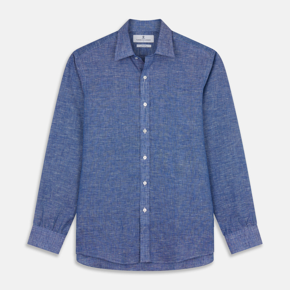 The Indigo Linen Weekend Fit Shirt with Derby Collar by Turnbull & Asser, shown flat on a white background, features long sleeves, white buttons, and buttoned cuffs—ideal for pairing with a classic suit or for casual wear.