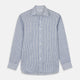 The Turnbull & Asser Sky Blue Linen Stripe Weekend Fit Shirt features blue and white vertical stripes, a Derby collar, and buttoned cuffs—ideal for pairing with classic cotton suits or other Weekend Fit shirts.