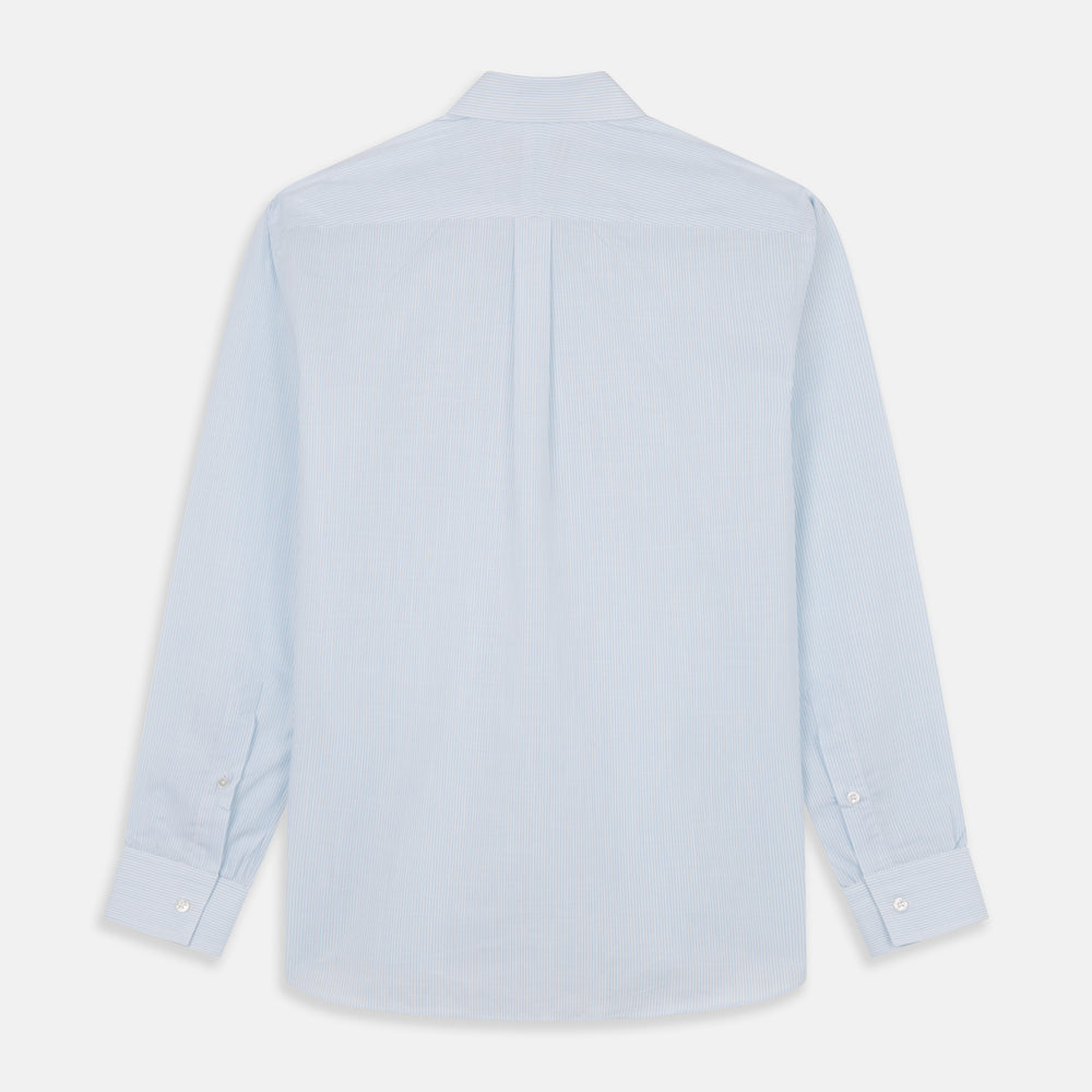 The Turnbull & Asser Sky Blue Chambray Stripe Weekend Fit Shirt features a Dorset collar, long sleeves, and two button-flap chest pockets, offering a relaxed look. Displayed on a plain white background.