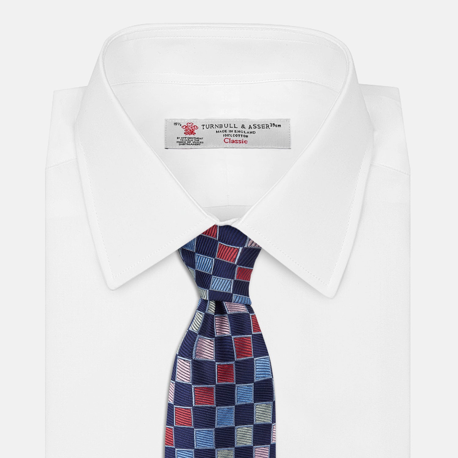 View 2 of product The Pink Multi Check Silk Tie by Turnbull & Asser features blue, red, and light green squares on a white background—an ideal summer accessory that complements bold shirts.