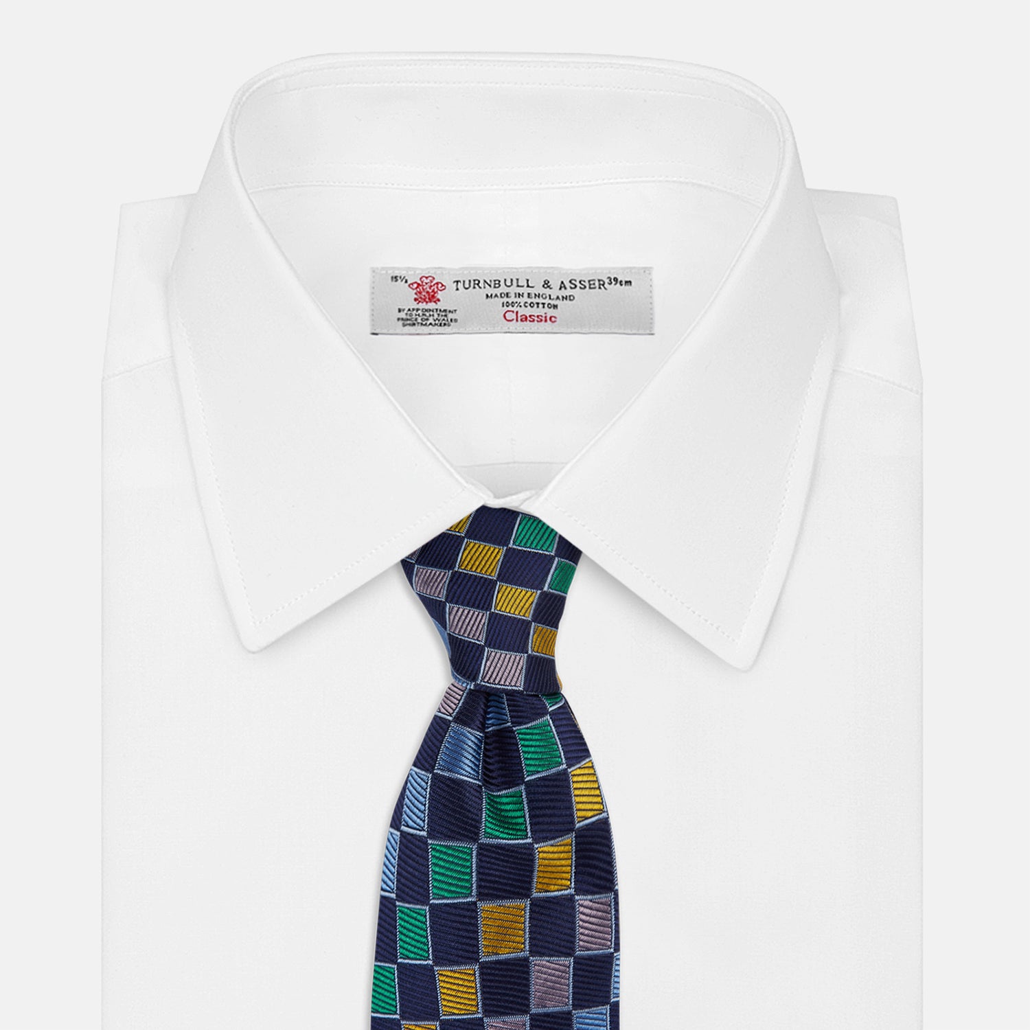 View 2 of product The Green Multi Check Silk Tie by Turnbull & Asser features a green checkered pattern with blue, yellow, and light purple squares on dark blue—ideal for bold shirts and a vibrant summer palette.