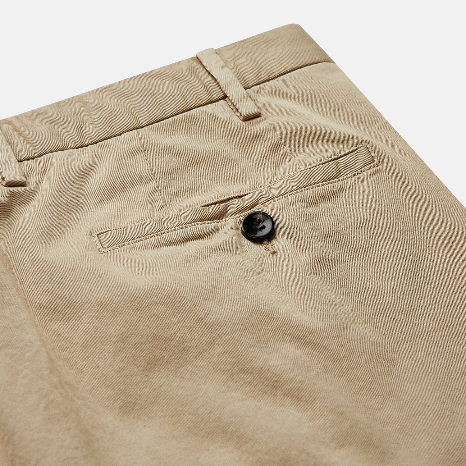 View 2 of product Turnbull & Asser's Taupe Classic Chino Manson Trouser, tailored in Italy from stretch cotton, features a button and zip closure, front pockets, and a straight-leg fit. Shown in taupe on a white background.