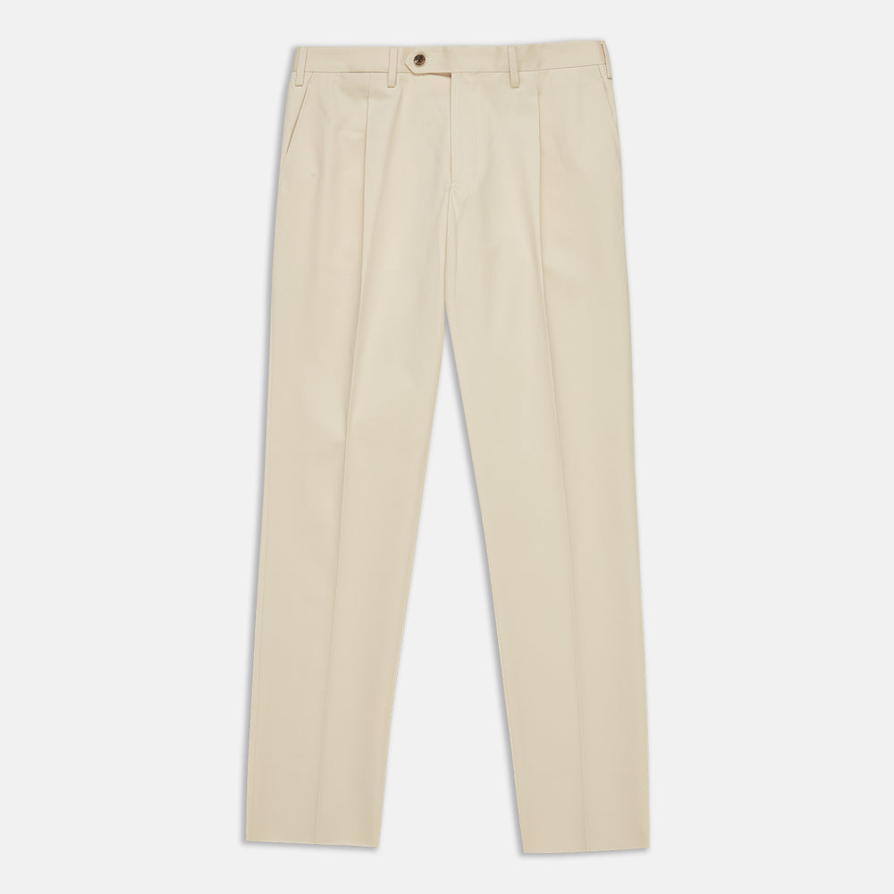 The Turnbull & Asser Sand Cotton Pleated Gerry Trouser features belt loops, front pockets, a button closure, and a classic fit. Shown laid flat on a white background.