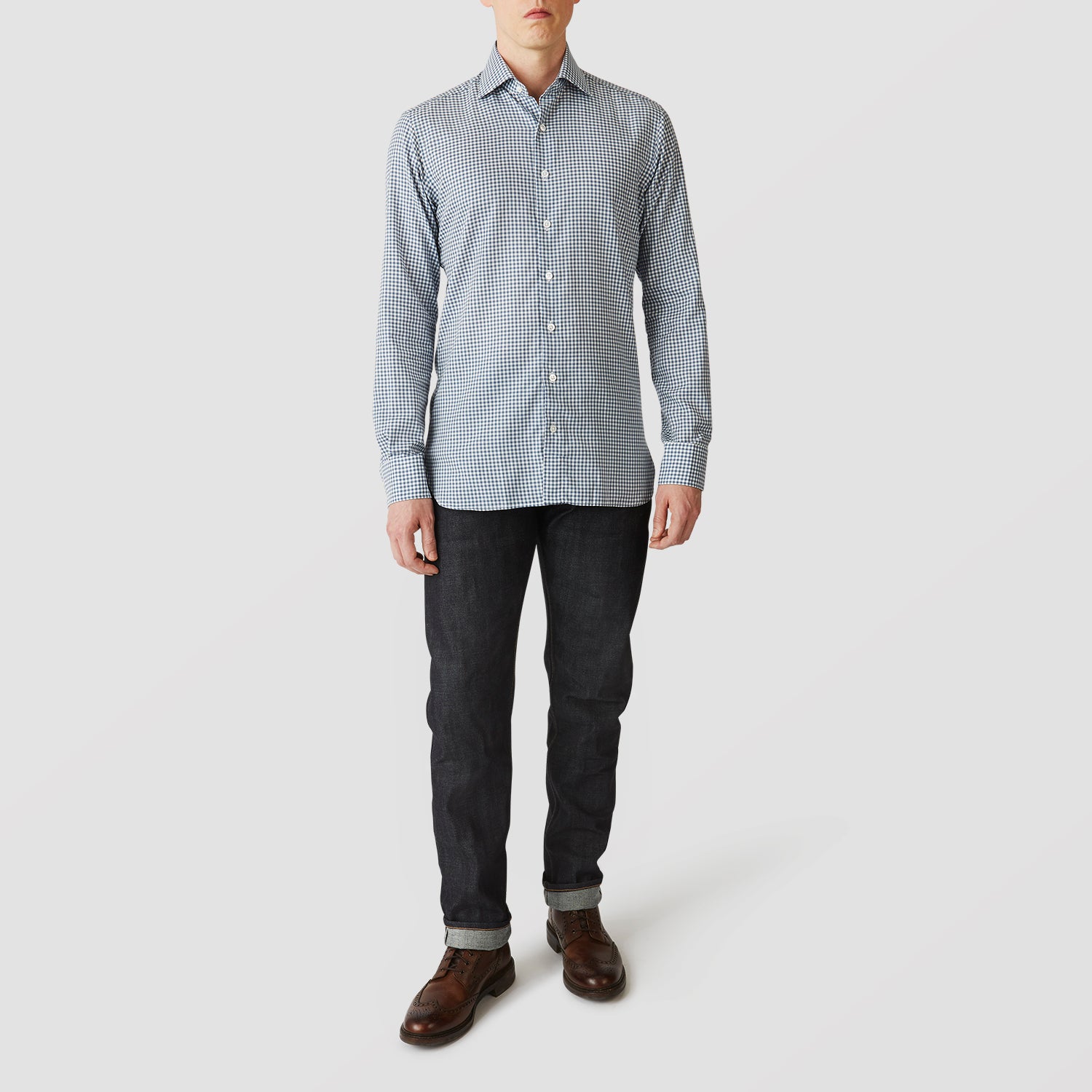 View 2 of product The Turnbull & Asser Blue Multi Check Tailored Fit Shirt features a Kent collar, 2-button cuffs, and a fine blue and white checked pattern—an essential men's wardrobe piece—shown flat on a white background.