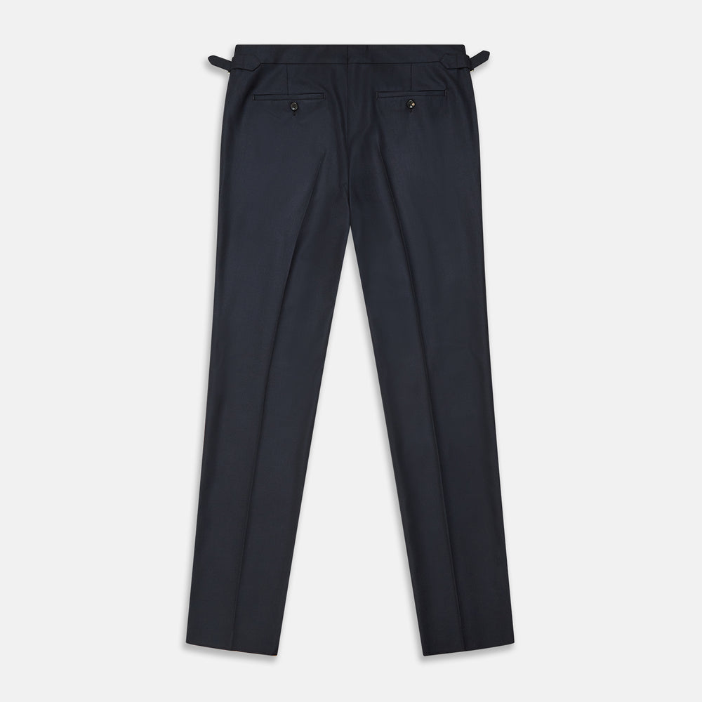 The Navy Escorial Wool Jonathan Trousers by Turnbull & Asser, featuring side adjusters, front pleats, and side pockets, are shown laid flat on a white background.