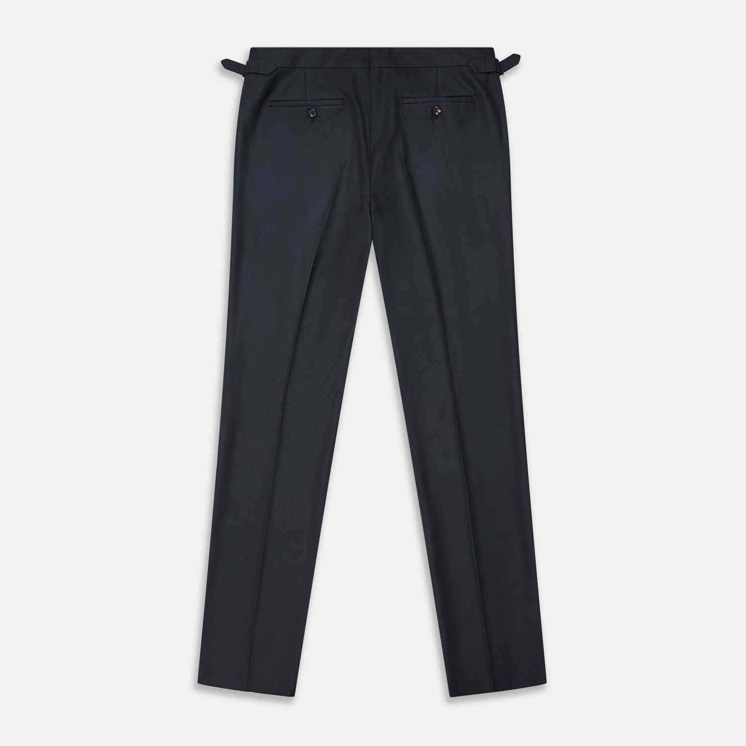 View 3 of product The Navy Escorial Wool Jonathan Trousers by Turnbull & Asser, featuring side adjusters, front pleats, and side pockets, are shown laid flat on a white background.