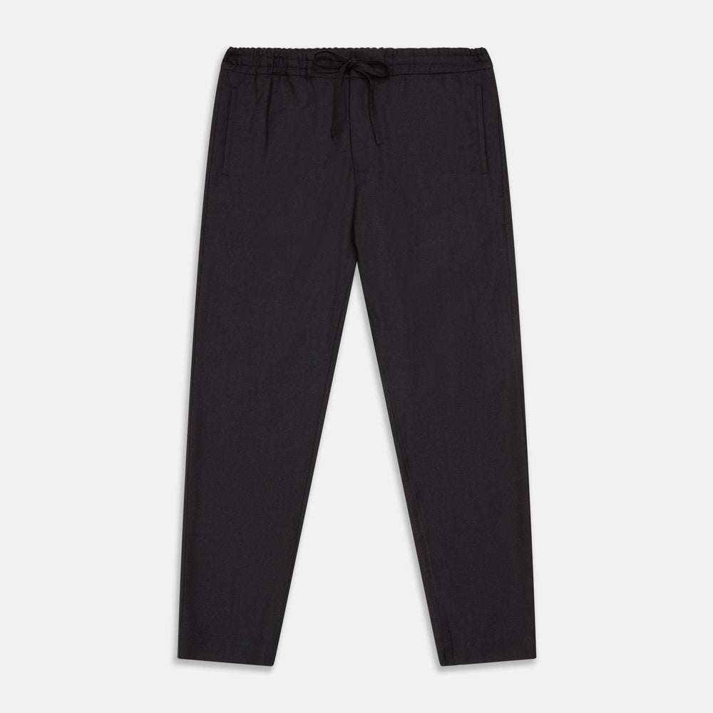 Turnbull & Asser Charcoal Tailored Drawstring Trousers in wool flannel, featuring an elastic waistband, straight legs, and side pockets, shown laid flat on a white background.