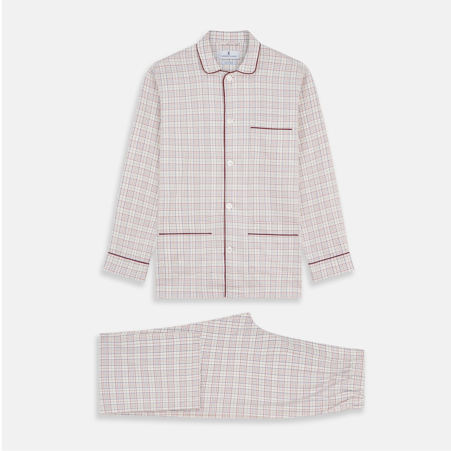 View 1 of product The Turnbull & Asser Red Multi Check Cotton-Cashmere Modern Pyjama Set, made in England, features a long-sleeve button-up shirt and pants in red and gray plaid with dark piping, crafted from soft Italian cotton-cashmere.