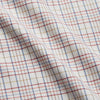 View 4 of product The Turnbull & Asser Red Multi Check Cotton-Cashmere Modern Pyjama Set, made in England, features a long-sleeve button-up shirt and pants in red and gray plaid with dark piping, crafted from soft Italian cotton-cashmere.