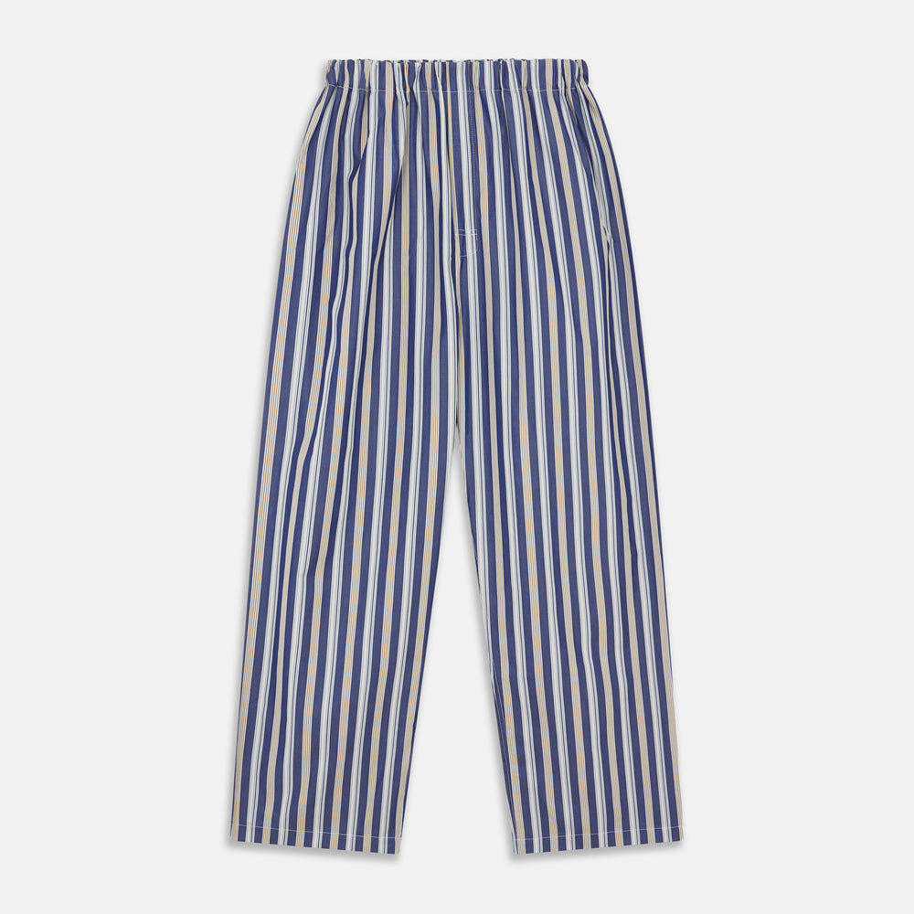 Turnbull & Asser's Blue Multi Stripe Cotton Modern Pyjama Set features a camp collar shirt with white buttons, front pocket, and long sleeves. Both pieces showcase classic blue and beige stripes for a timeless look.