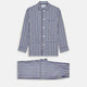 Turnbull & Asser's Blue Multi Stripe Cotton Modern Pyjama Set features a camp collar shirt with white buttons, front pocket, and long sleeves. Both pieces showcase classic blue and beige stripes for a timeless look.