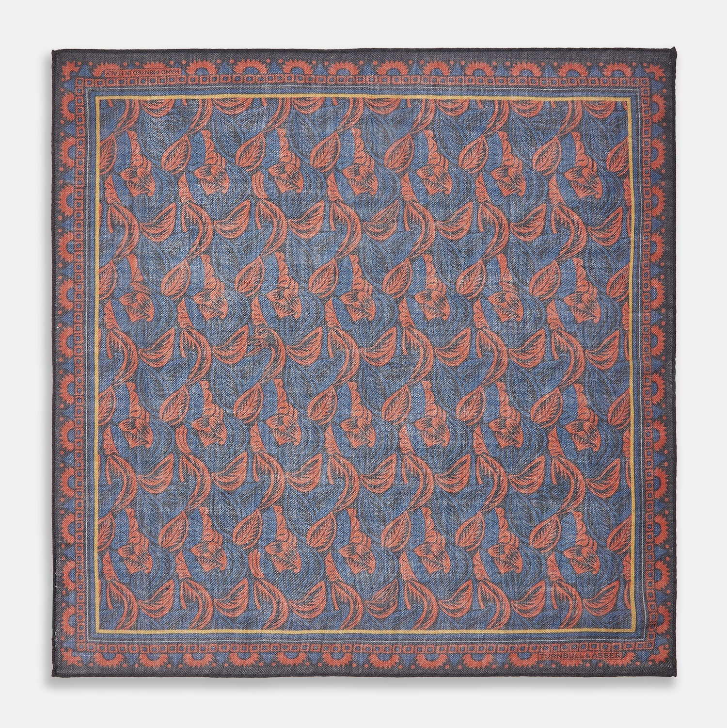 View 1 of product The Turnbull & Asser Navy Multi Camo Birds Wool Twill Pocket Square features a colorful camo bird pattern on navy wool twill with multicolor borders and a geometric edge design. Made in Italy.