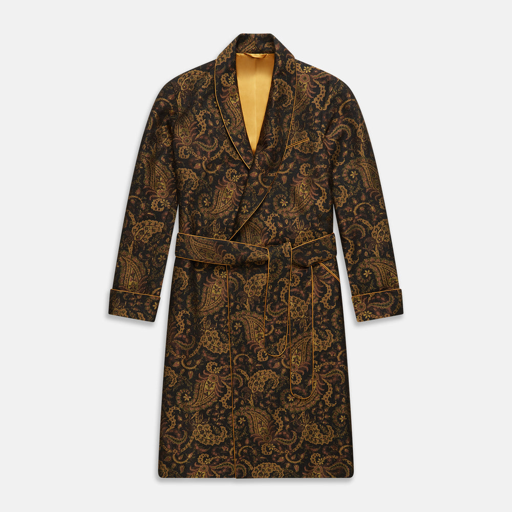 The Turnbull & Asser Gold Multi Floral Cotton, Wool & Silk Jacquard Pierce Gown features a shawl collar, matching belt, golden lining, and an elegant floral pattern in luxurious black, gold, and brown tones.