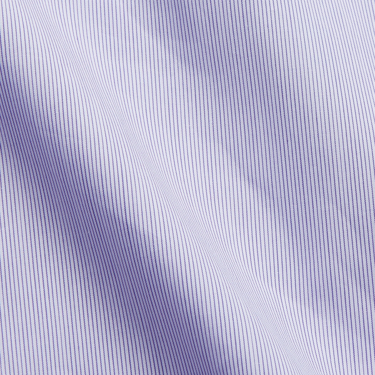 View 4 of product The Turnbull & Asser Purple Hairline Stripe Regular Fit Twill Shirt features a T&A collar, double cuffs, long sleeves, and white buttons, shown laid flat on a white background.