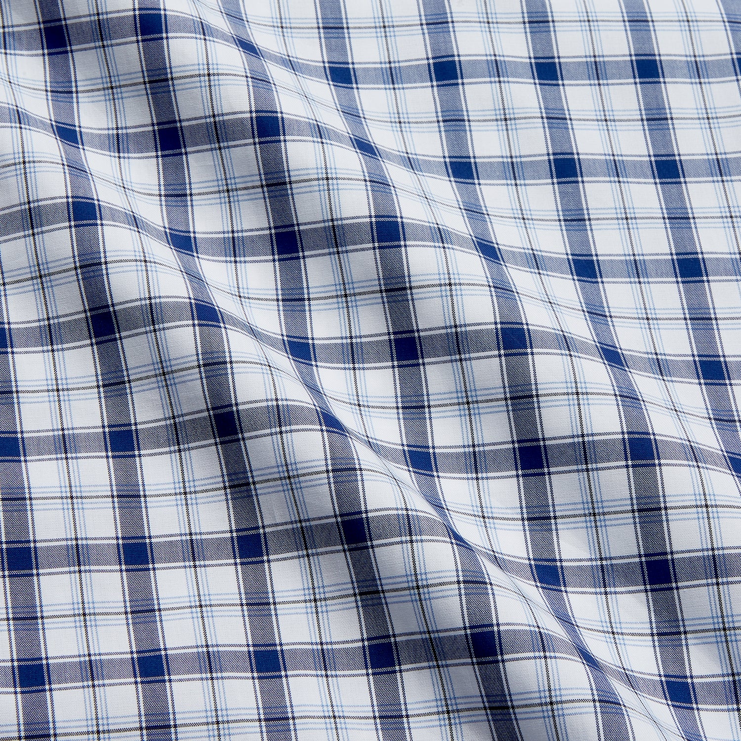View 4 of product Turnbull & Asser's Navy Multi Check Regular Fit Shirt features a T&A collar, 3 button cuffs, and a blue and white plaid pattern, crafted from Italian cotton poplin with long sleeves and shown on a plain white background.