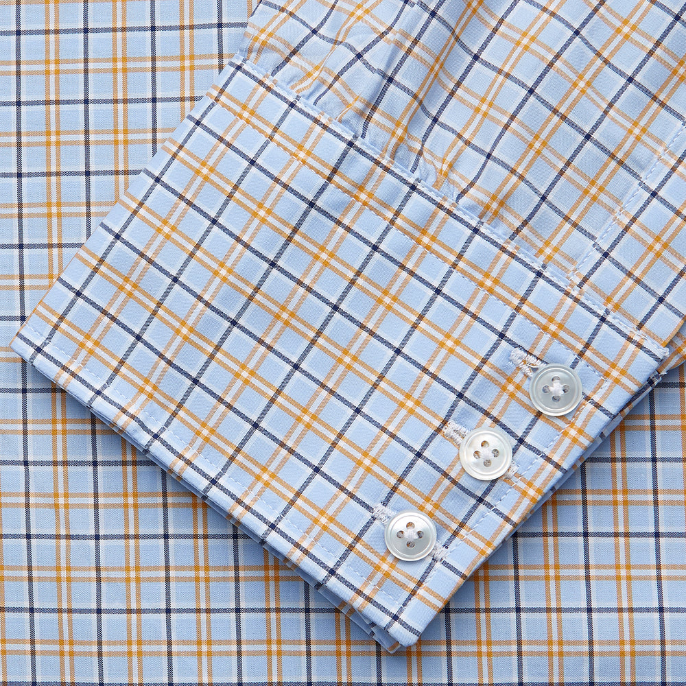 Turnbull & Asser Blue, Orange & Navy Check Regular Fit Shirt features a T&A collar and 3 button cuffs, made from Italian cotton poplin, shown flat on a white background.