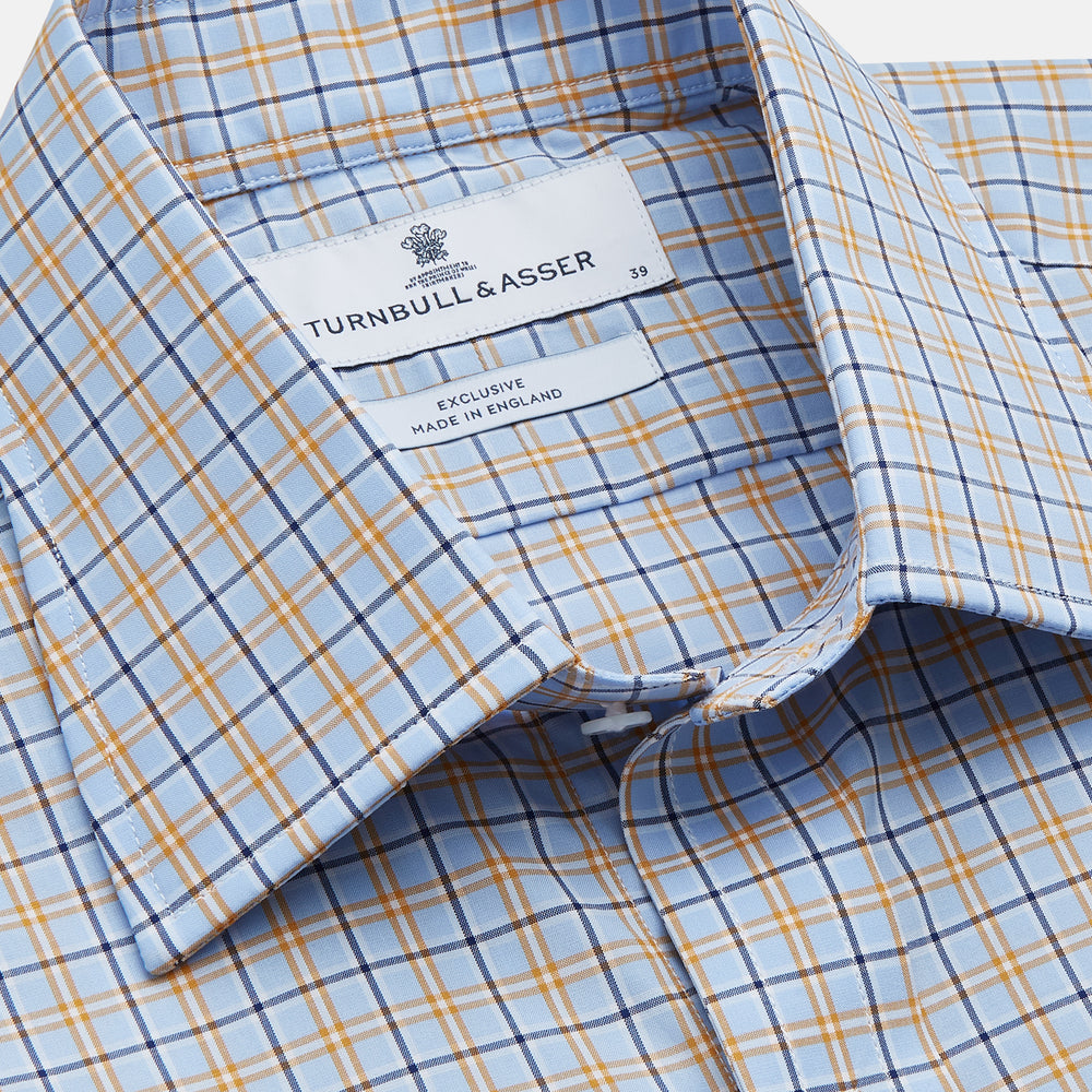 Turnbull & Asser Blue, Orange & Navy Check Regular Fit Shirt features a T&A collar and 3 button cuffs, made from Italian cotton poplin, shown flat on a white background.