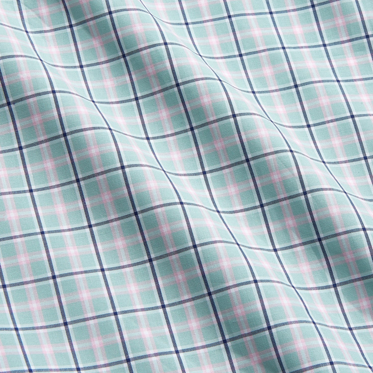 View 4 of product The Turnbull & Asser Green, Navy & Pink Check Regular Fit Shirt features a T&A collar, 3 button cuffs, and white buttons. Crafted from Italian cotton poplin, it’s displayed on a white background.