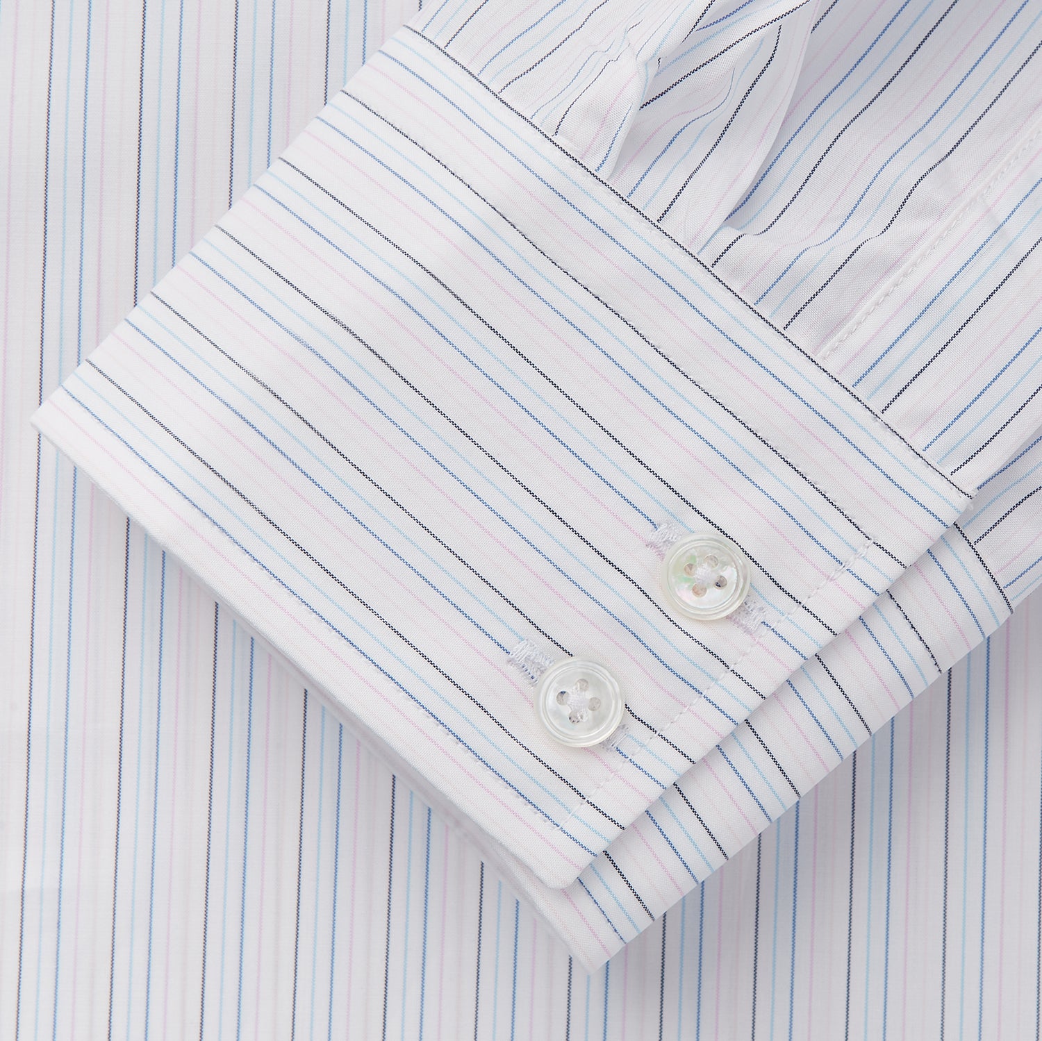 View 3 of product The Turnbull & Asser Blue Multi Stripe Tailored Fit Shelton Shirt features a Kent collar and thin blue and gray vertical stripes on white. This long-sleeve, button-down is displayed neatly against a plain white background.