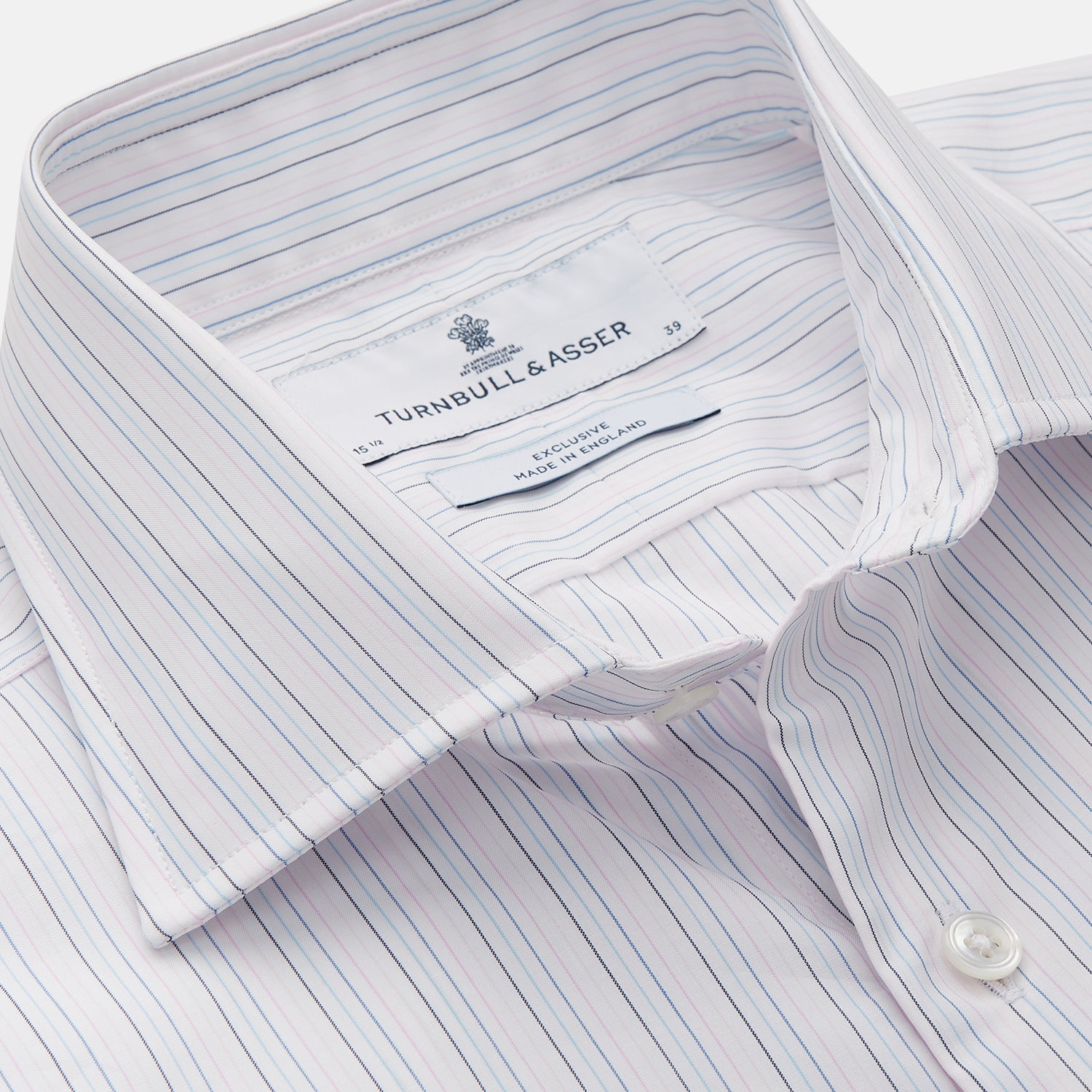 View 2 of product The Turnbull & Asser Blue Multi Stripe Tailored Fit Shelton Shirt features a Kent collar and thin blue and gray vertical stripes on white. This long-sleeve, button-down is displayed neatly against a plain white background.