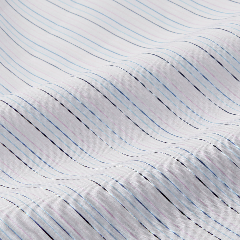 The Turnbull & Asser Blue Multi Stripe Tailored Fit Shelton Shirt features a Kent collar and thin blue and gray vertical stripes on white. This long-sleeve, button-down is displayed neatly against a plain white background.