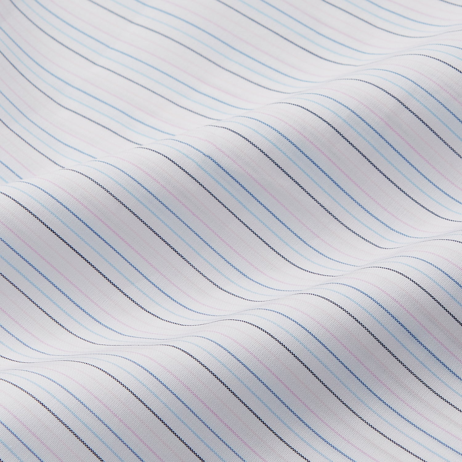View 4 of product The Turnbull & Asser Blue Multi Stripe Tailored Fit Shelton Shirt features a Kent collar and thin blue and gray vertical stripes on white. This long-sleeve, button-down is displayed neatly against a plain white background.