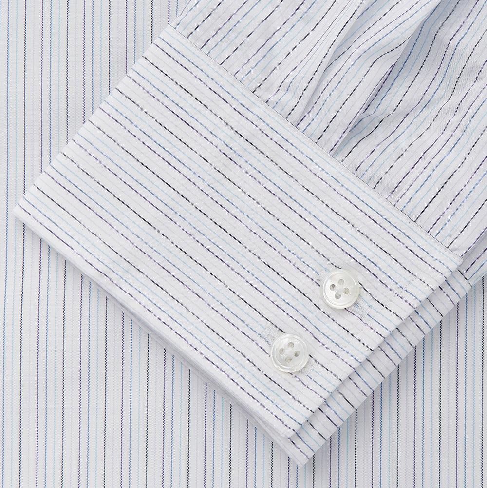 The Turnbull & Asser Purple Multi Stripe Tailored Fit Shelton Shirt features a Kent collar and buttoned cuffs, with a vertical pinstripe pattern, displayed flat on a white surface.