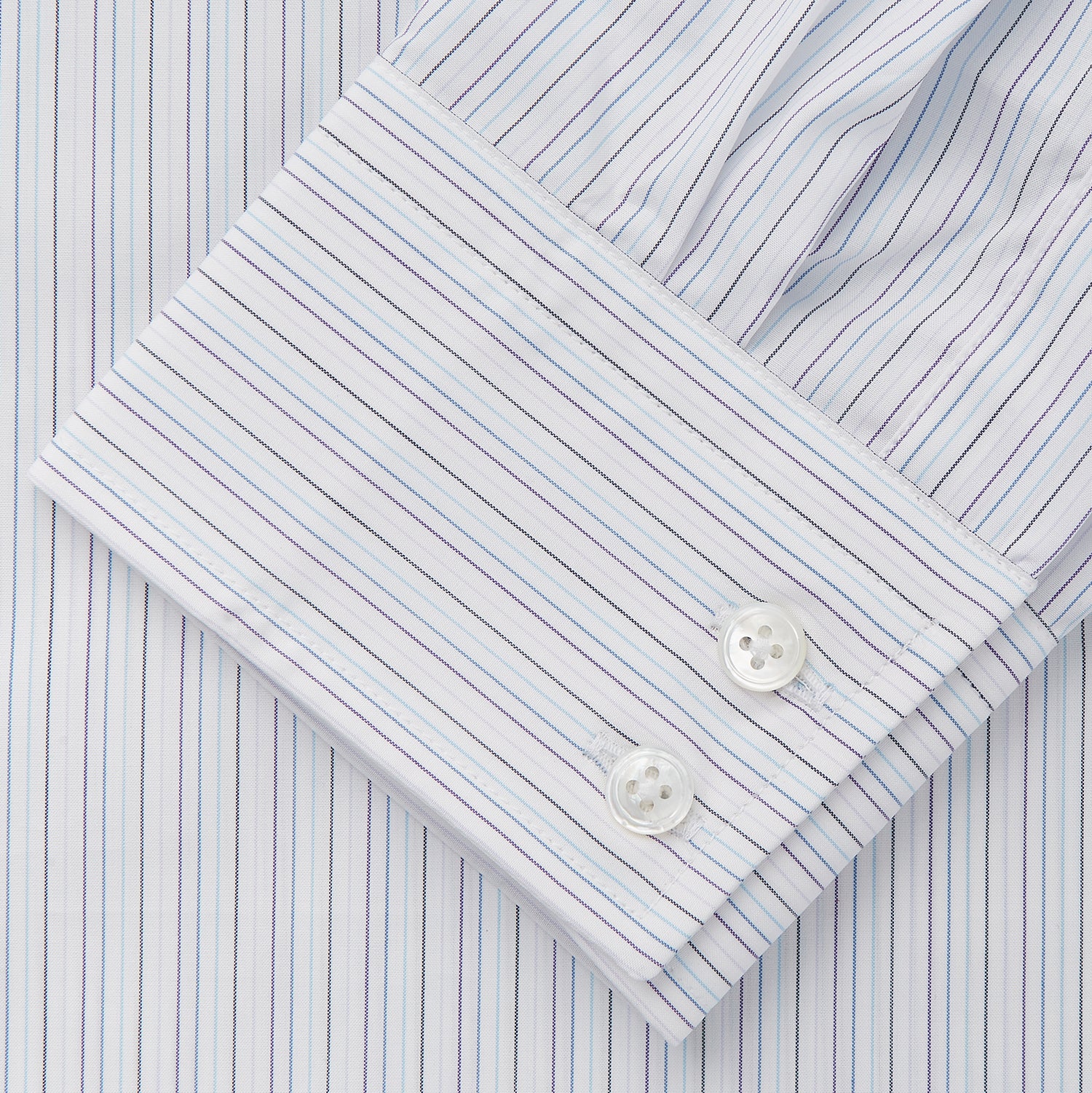 View 3 of product The Turnbull & Asser Purple Multi Stripe Tailored Fit Shelton Shirt features a Kent collar and buttoned cuffs, with a vertical pinstripe pattern, displayed flat on a white surface.