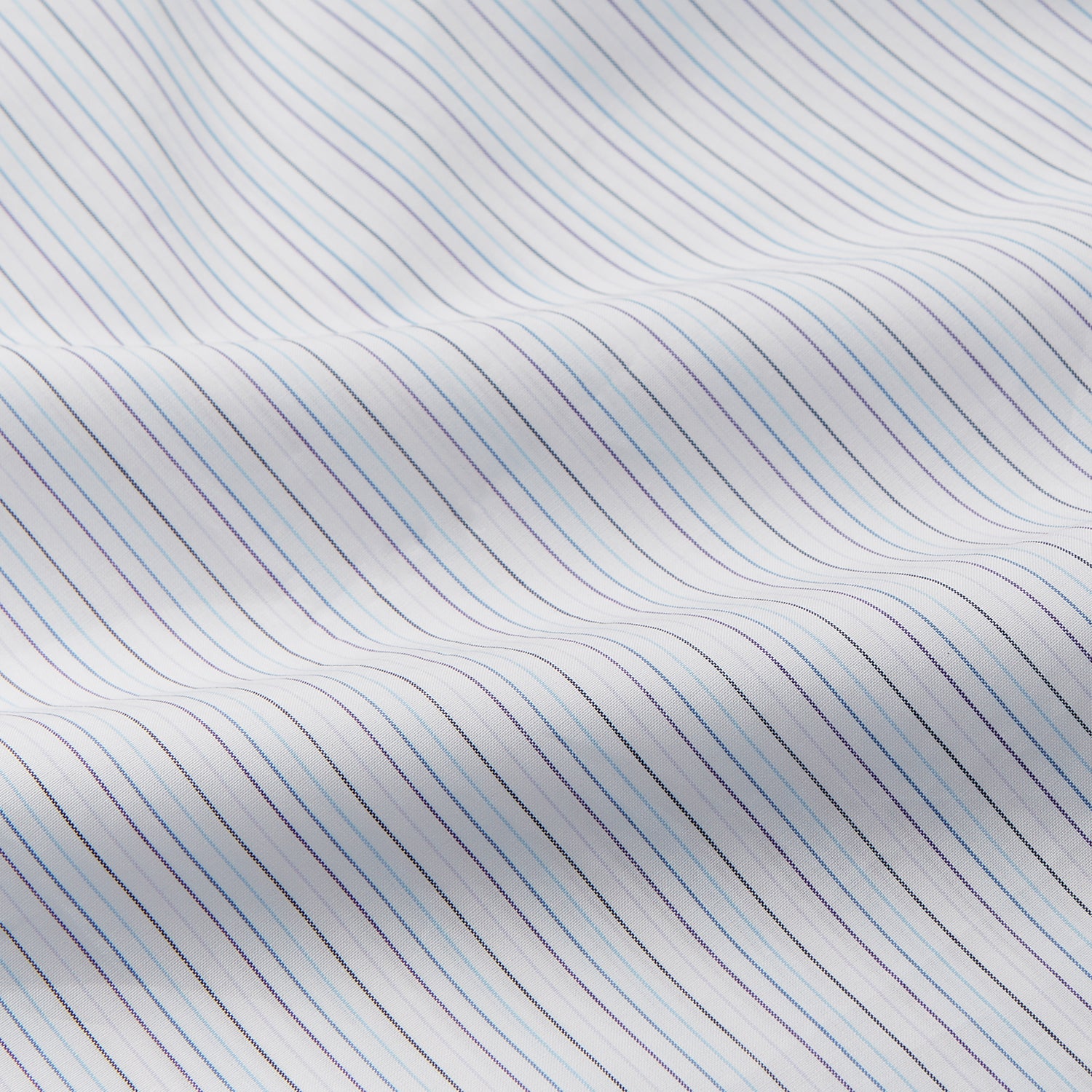 View 4 of product The Turnbull & Asser Purple Multi Stripe Tailored Fit Shelton Shirt features a Kent collar and buttoned cuffs, with a vertical pinstripe pattern, displayed flat on a white surface.