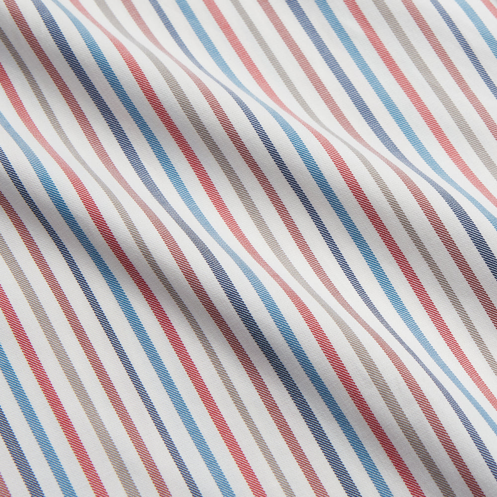 The Turnbull & Asser Burgundy Multi Stripe Tailored Fit Shirt features a Kent collar and 2 button cuffs, with vertical stripes on a light background. The shirt is neatly laid flat on a white surface.