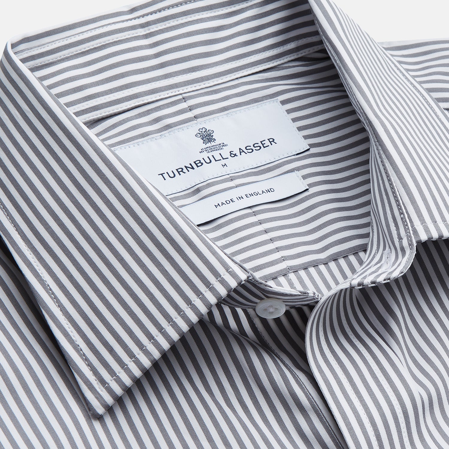 View 2 of product The Turnbull & Asser Grey & White Stripe Weekend Fit Shirt features a Derby collar, 1-button cuffs, and chest pocket—ideal for casual weekends. Shown on a plain white background.