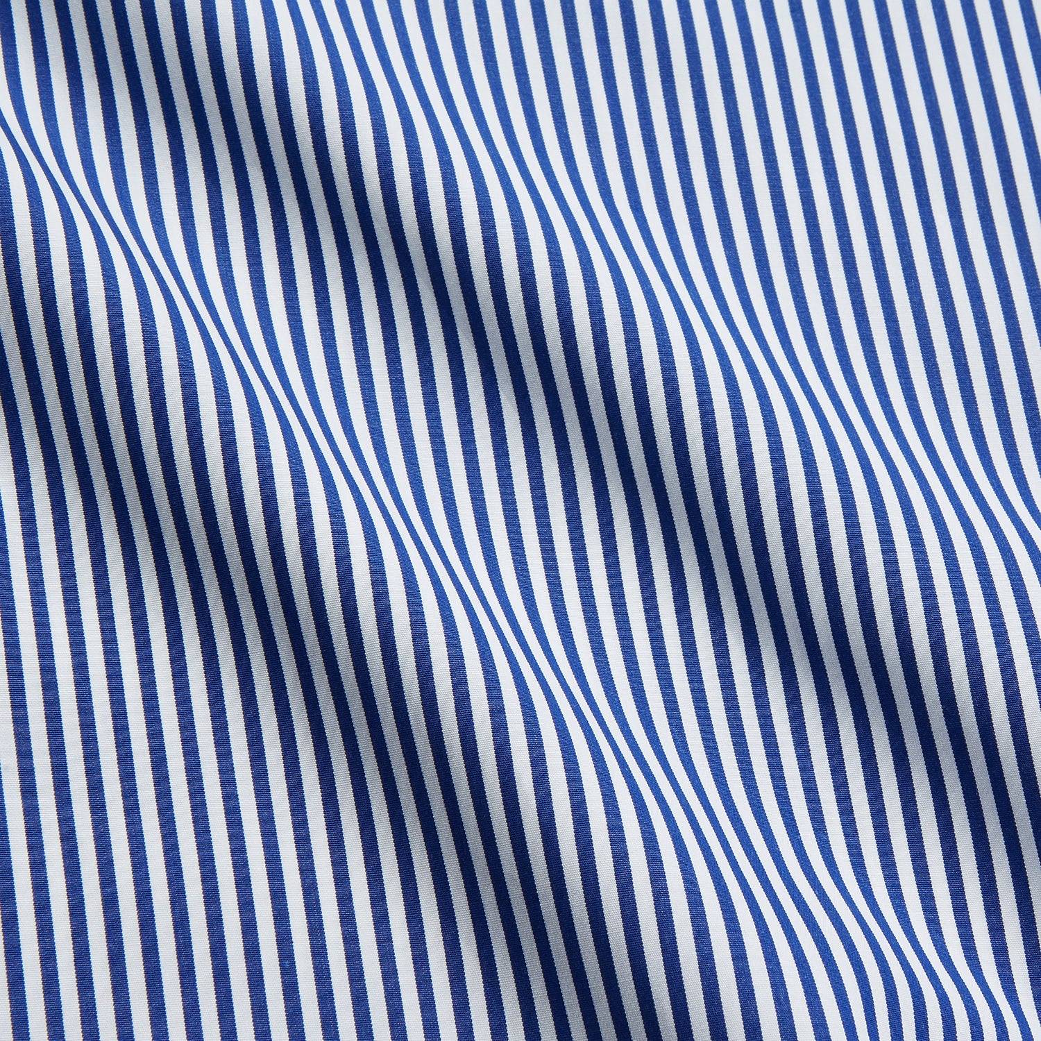 View 4 of product The Turnbull & Asser Navy & White Stripe Weekend Fit Shirt features a Derby collar, 1-button cuffs, front chest pocket, vertical stripes, and white buttons. Displayed flat on a white background.