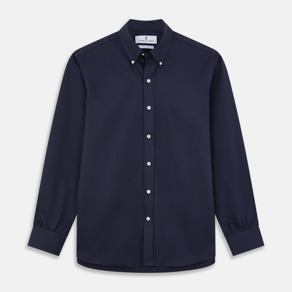 The Turnbull & Asser Navy Weekend Fit Shirt features a Dorset collar, 1 button cuffs, and white buttons, shown laid flat against a white background.