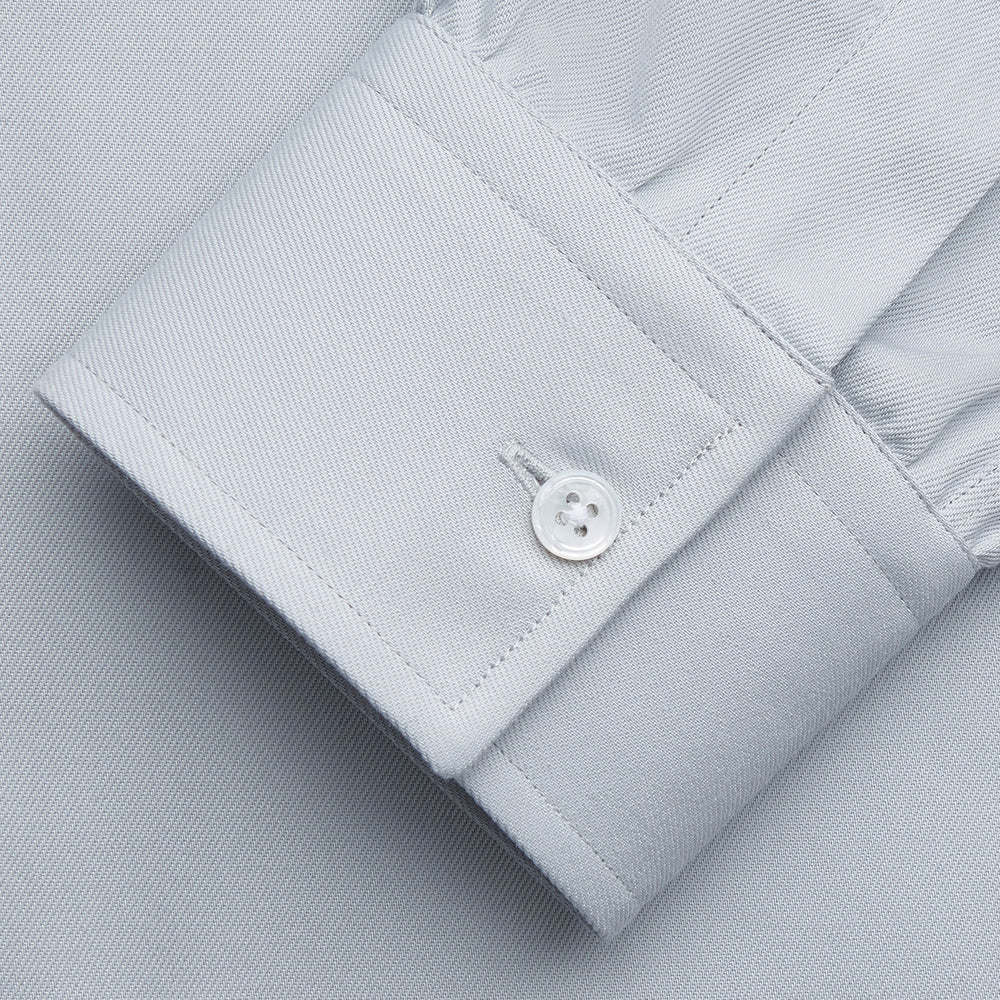 A grey Weekend Fit Shirt by Turnbull & Asser, featuring a Dorset collar and single button cuffs, is displayed against a plain white background.
