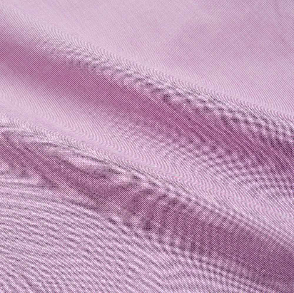 The Turnbull & Asser Pink Weekend Fit Shirt features a Long Point collar, single button cuffs, and a front pocket, shown laid flat on a white background.