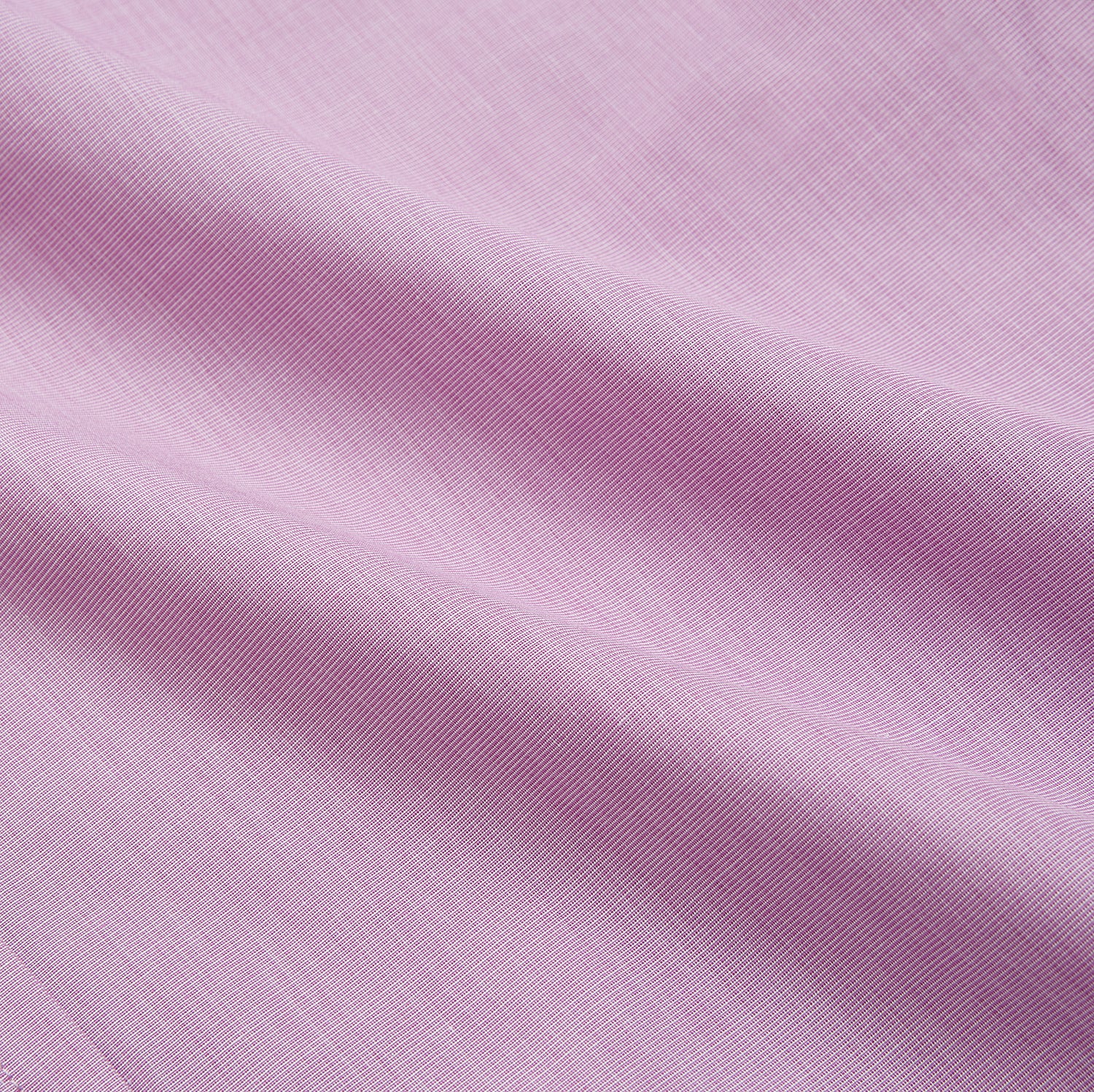 View 4 of product The Turnbull & Asser Pink Weekend Fit Shirt features a Long Point collar, single button cuffs, and a front pocket, shown laid flat on a white background.