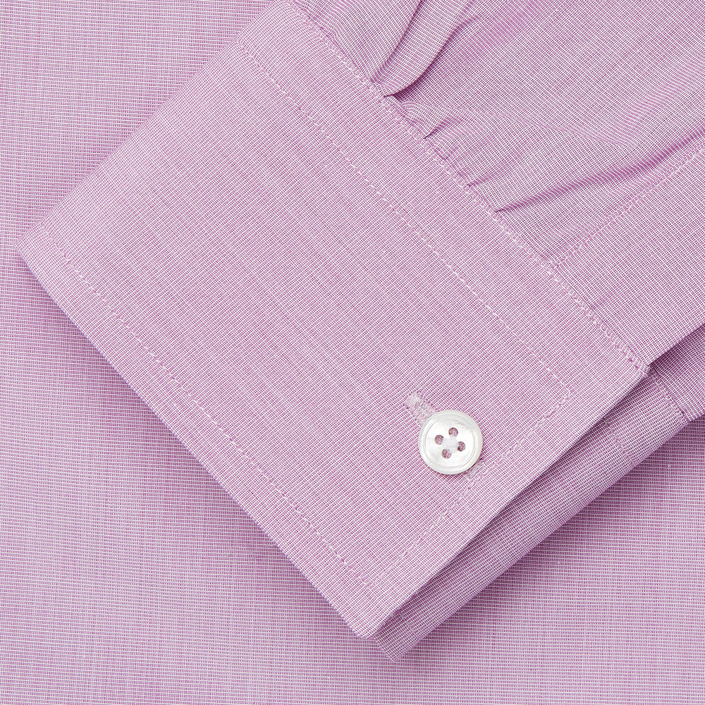 The Turnbull & Asser Pink Weekend Fit Shirt features a Long Point collar, single button cuffs, and a front pocket, shown laid flat on a white background.