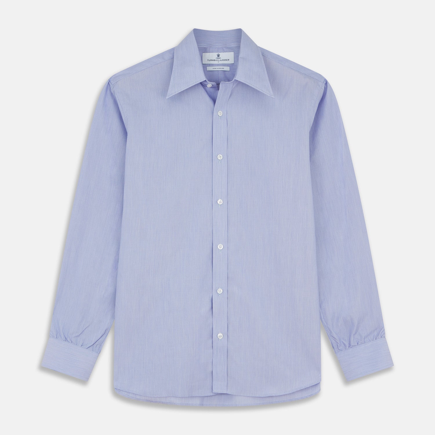 View 1 of product The Turnbull & Asser Pale Blue Weekend Fit Shirt with a Long Point collar and single button cuffs is laid flat on a white background.