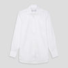 View 1 of product The Turnbull and The Deck White Cotton Traditionalist Shirt by Turnbull & Asser features a classic collar, buttoned front and cuffs, and a refined Royal Oxford weave, shown on a plain light gray background.