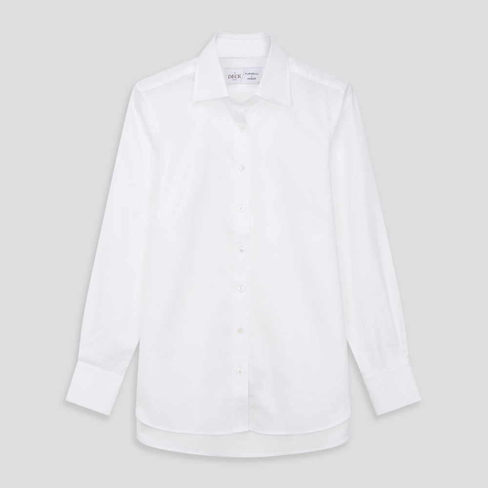The Turnbull and The Deck White Cotton Traditionalist Shirt by Turnbull & Asser features a classic collar, buttoned front and cuffs, and a refined Royal Oxford weave, shown on a plain light gray background.